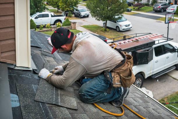 Professional Roof Replacement technician working in Herminie, PA